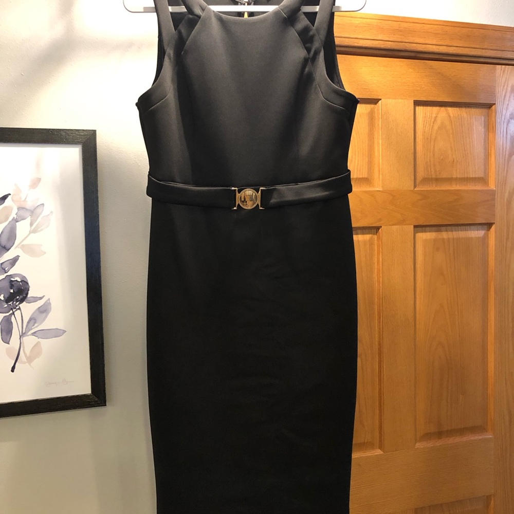 Beautiful black Guess dress size 14. Scuba fabric.
